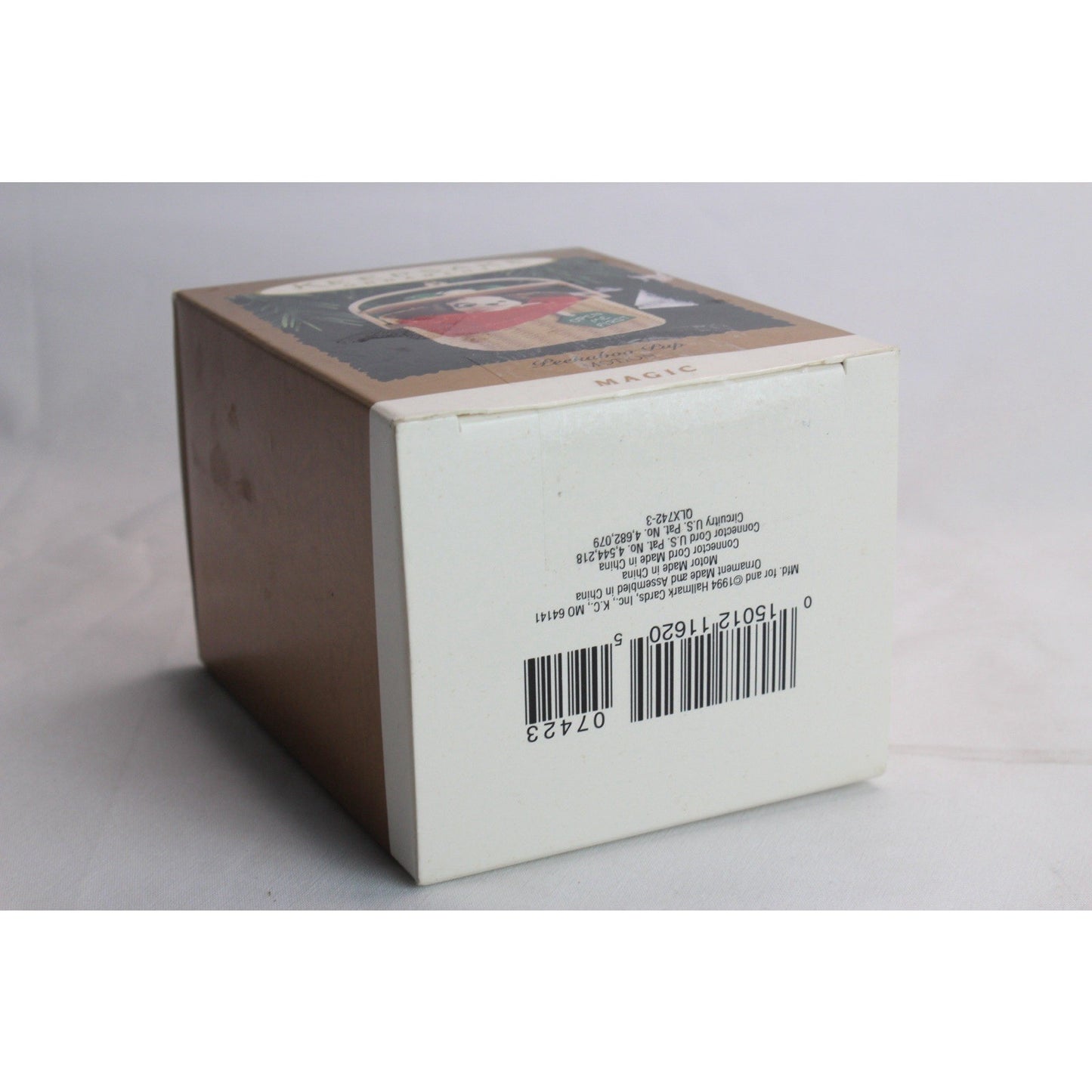 1994 Hallmark Keepsake Ornament Peekaboo Pup Magic Motion Christmas Tree Decor