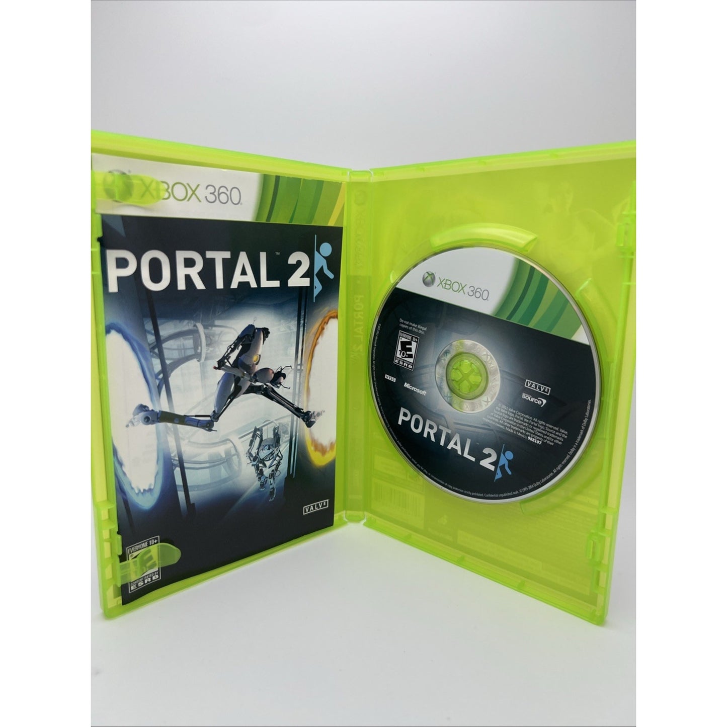Portal 2 Microsoft Xbox 360 Video Game with Manual And Case Used