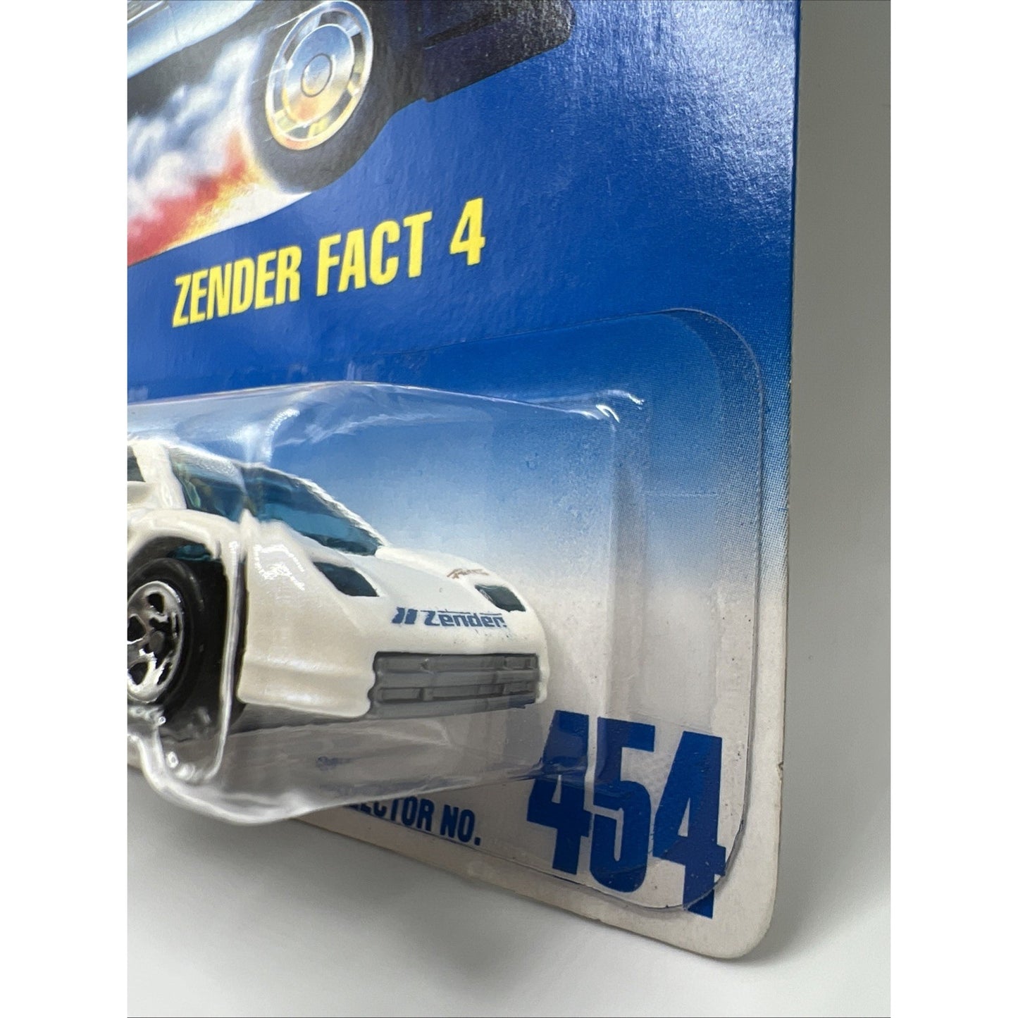1991 Hot Wheels Blue White Card #454 ZENDER FACT 4 Chrome 5 Spoke Wheels
