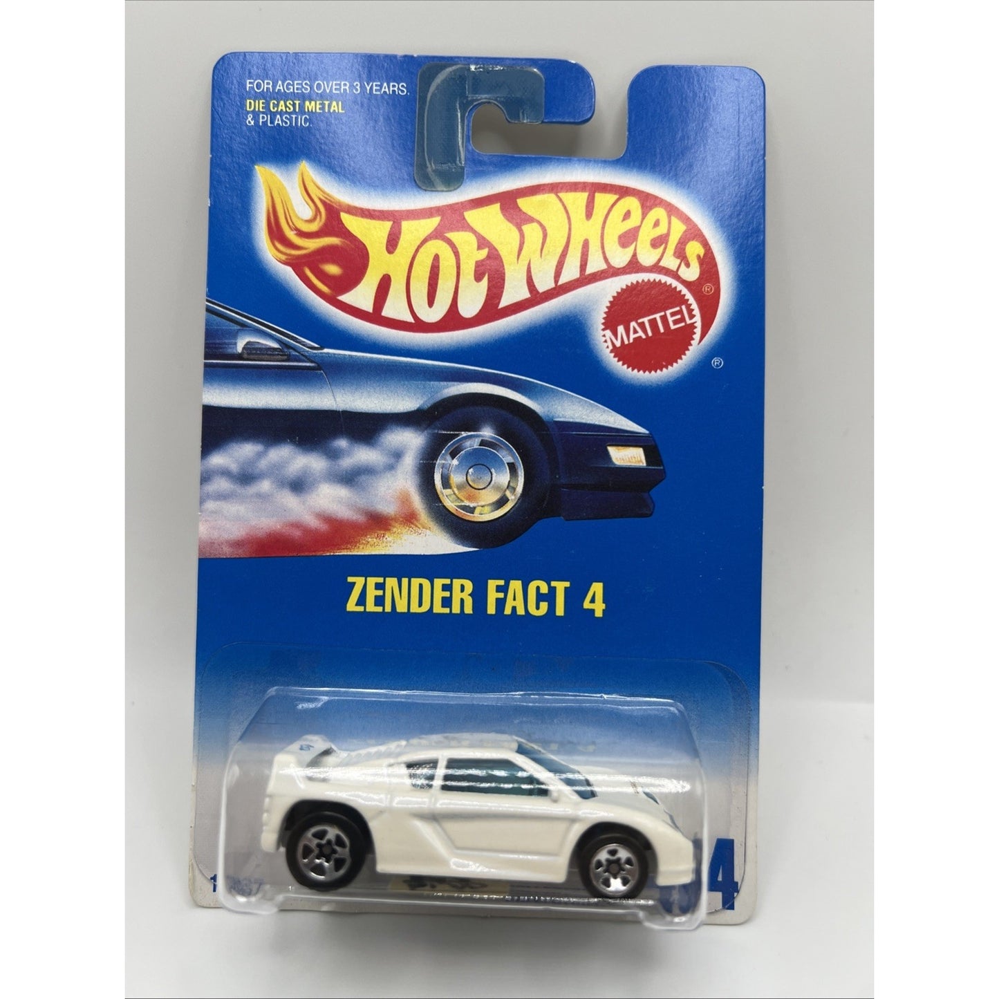 1991 Hot Wheels Blue White Card #454 ZENDER FACT 4 Chrome 5 Spoke Wheels