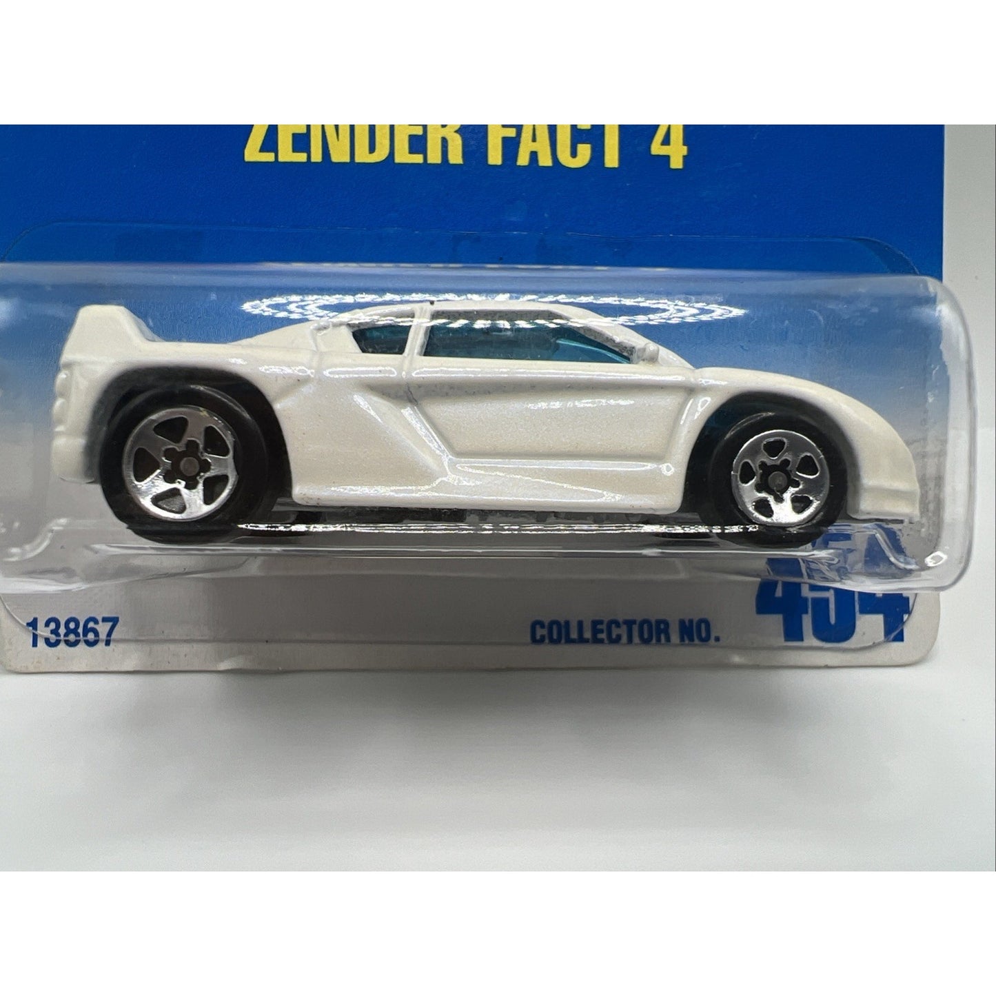 1991 Hot Wheels Blue White Card #454 ZENDER FACT 4 Chrome 5 Spoke Wheels